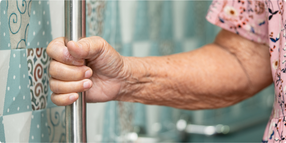 Elderly women safely entering tub